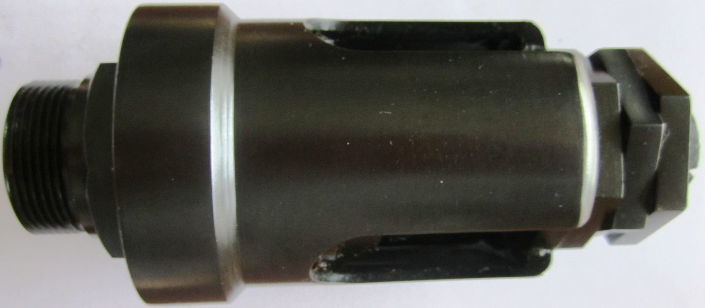Photo MG13 blank firing adapter in container