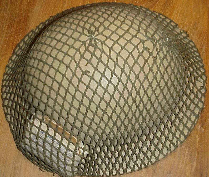 Photo English desert helmet with bandage and netting - 1942